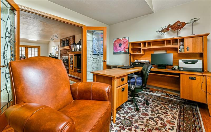10120 Deer View Point Road Wexford, PA 15090 - Photo 9 of 24 The den, which is located off the family room and front hall has a wall of windows which allows ample light to enter the room.