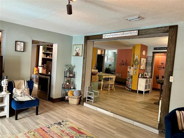 a kitchen with stainless steel appliances granite countertop a stove and a refrigerator