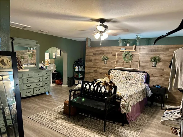 a bathroom with a sink mirror and vanity
