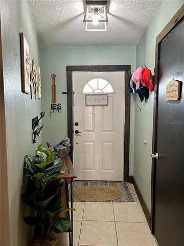 a bathroom with a toilet a sink and a window