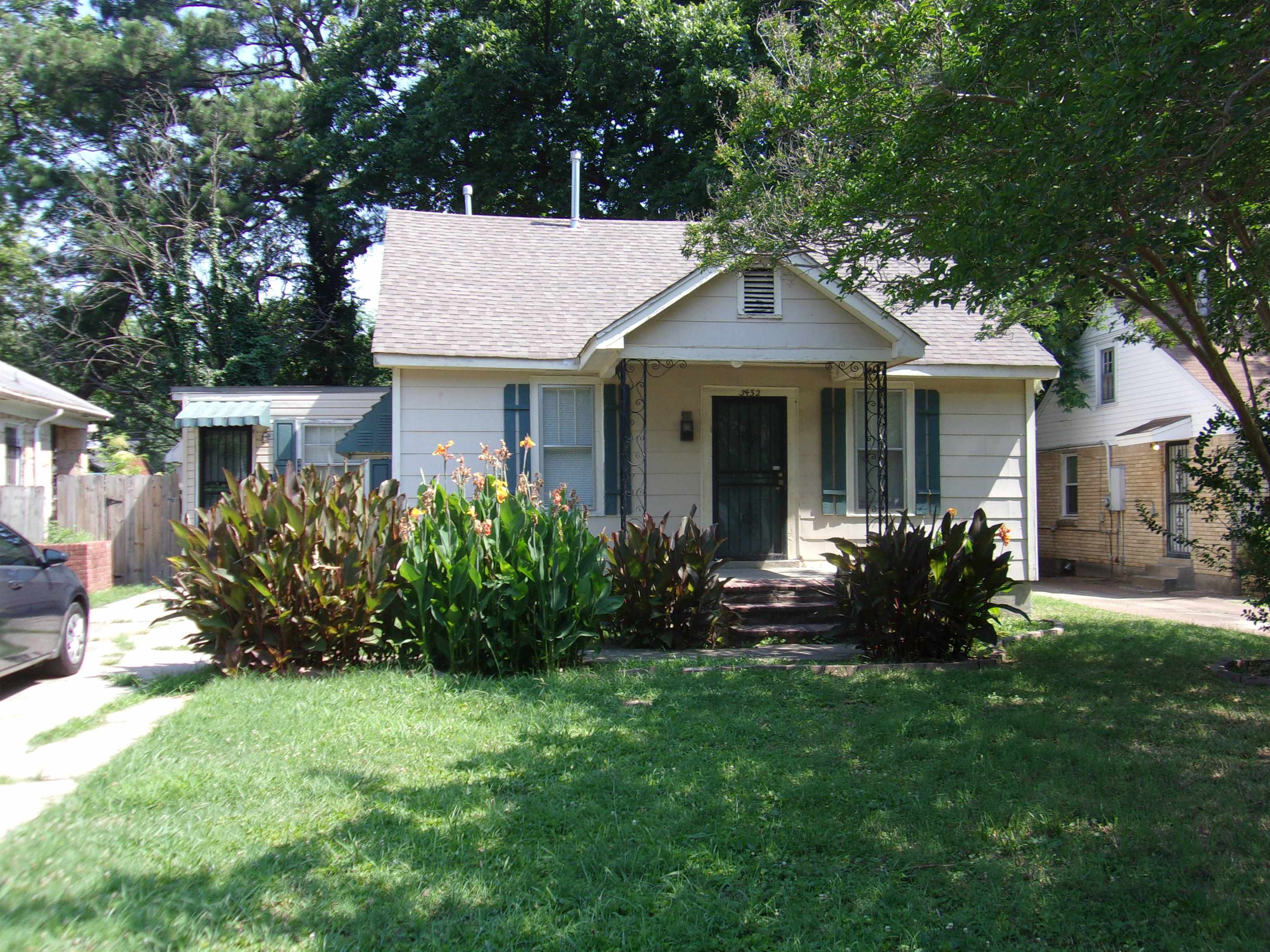 3430 Carrington Road Memphis, TN 38111 - Photo 1 of 13 a view of a house with a yard and plants