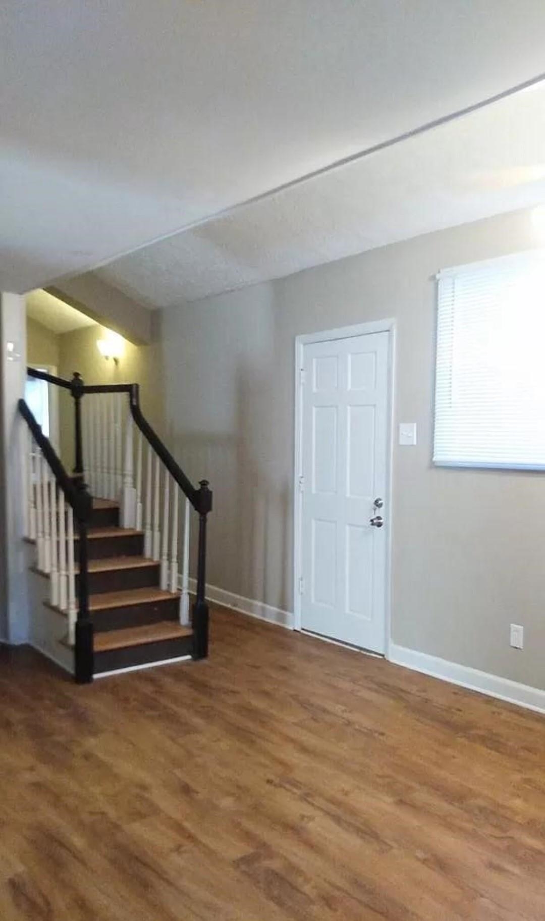3430 Carrington Road Memphis, TN 38111 - Photo 8 of 13 a view of entryway and hall with wooden floor