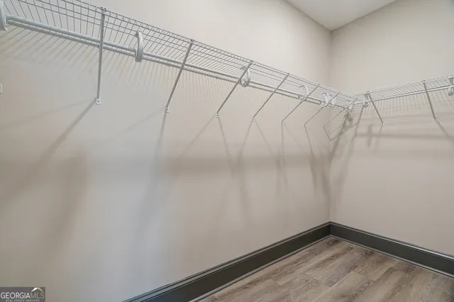 a view of a room with racks on the wall