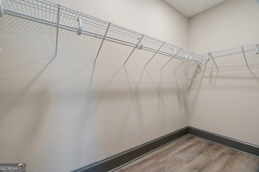 34 Depot Street, Unit 11 Hartwell, GA 30643 - Photo 13 of 21 a view of a room with racks on the wall