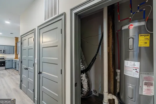 a view of a hallway with a livingroom