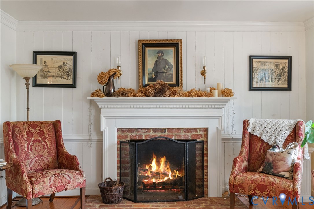 7381 McClellan Road Mechanicsville, VA 23111 - Photo 28 of 66 Formal living room with fireplace and a classic ma