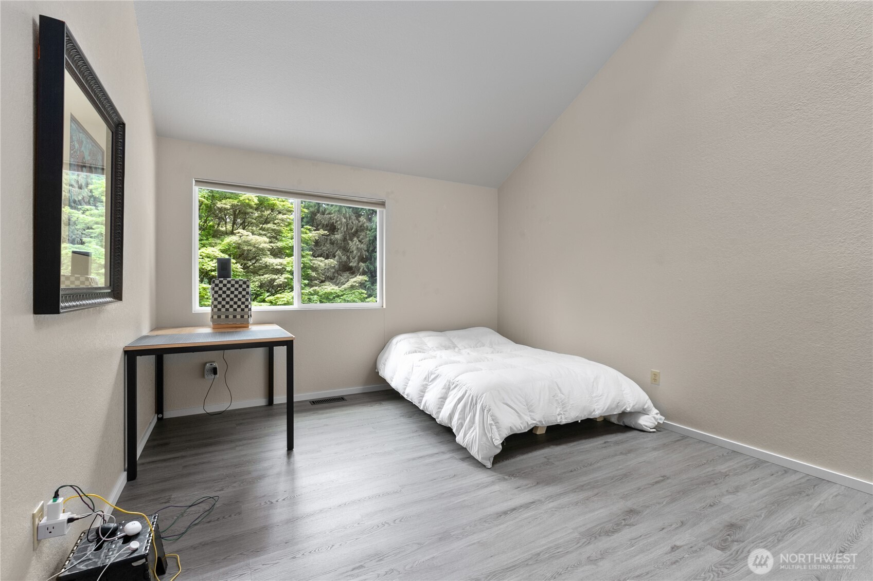 21521 47th Avenue Southeast Bothell, WA 98021 - Photo 28 of 40 a bedroom with a bed and a desk