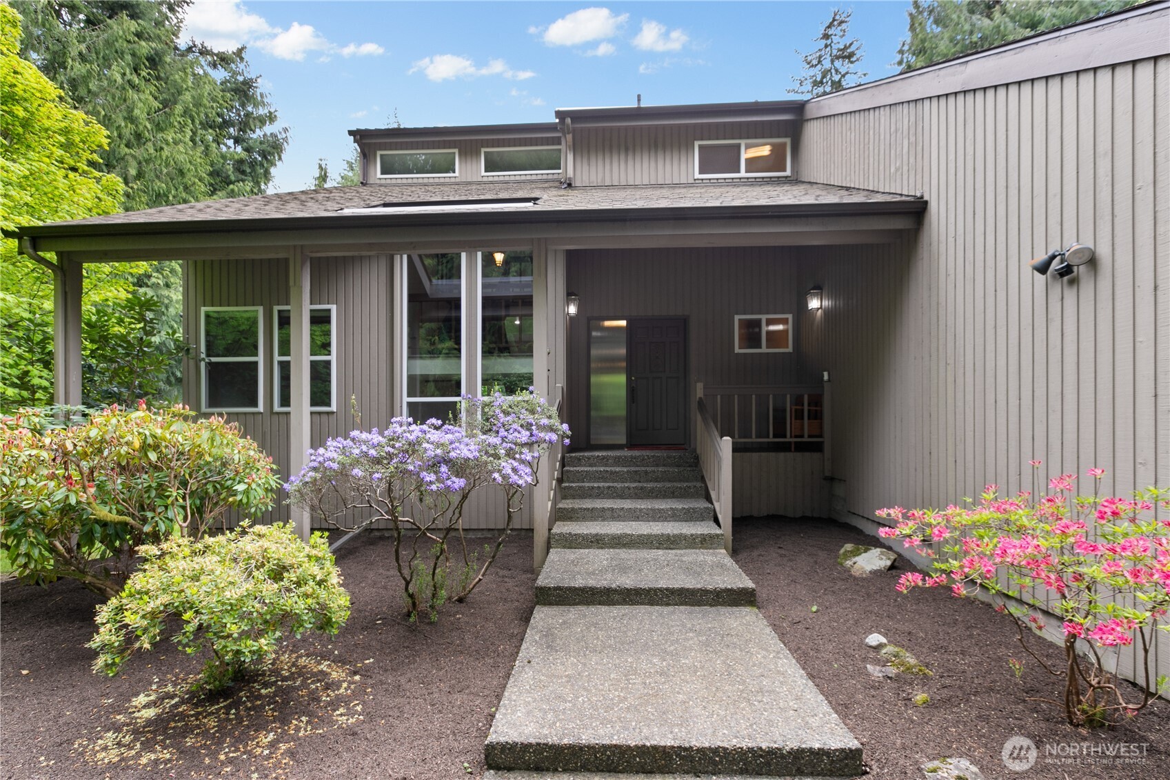 21521 47th Avenue Southeast Bothell, WA 98021 - Photo 3 of 40 a front view of a house