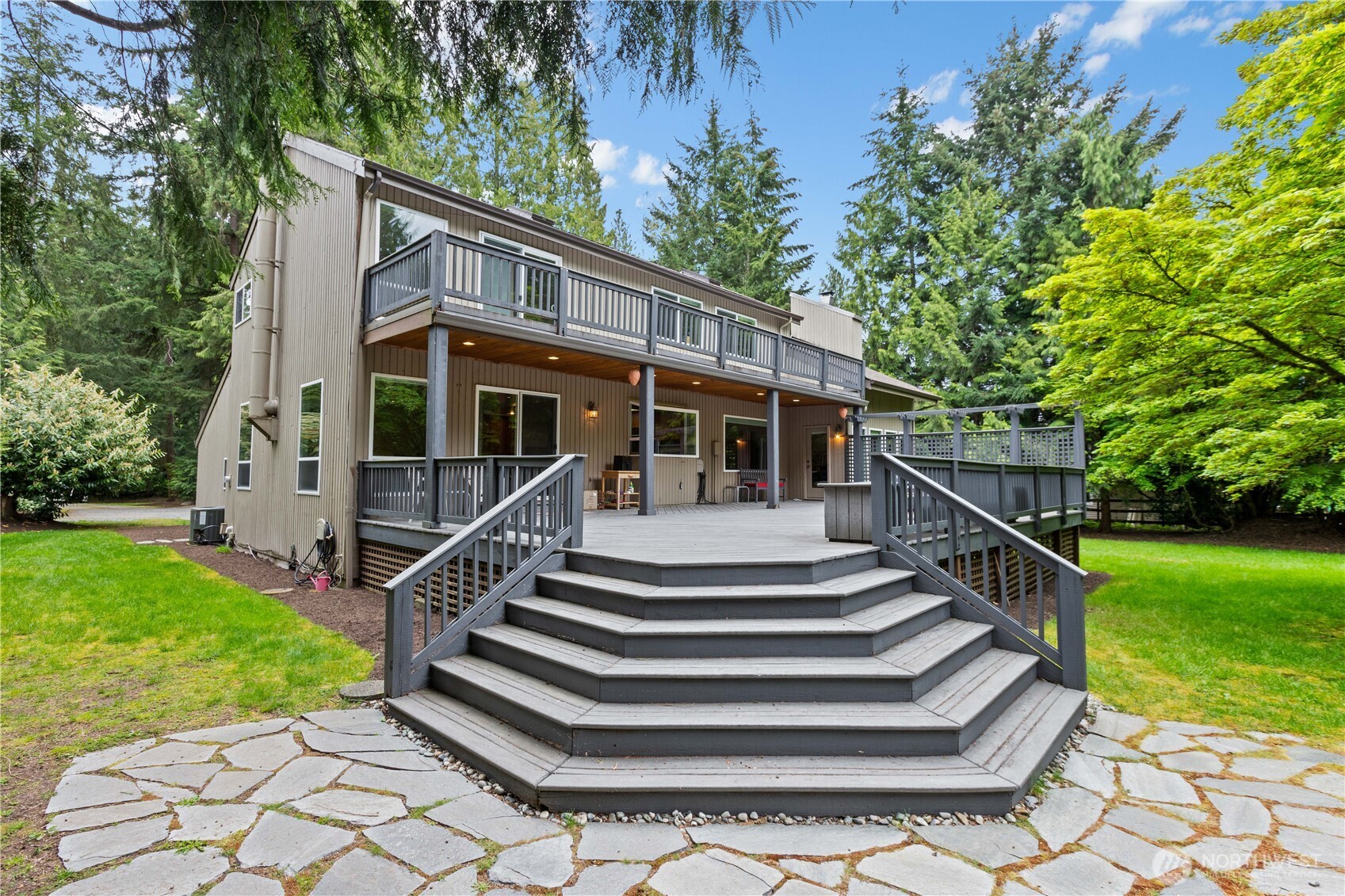 21521 47th Avenue Southeast Bothell, WA 98021 - Photo 31 of 40 a view of a house with a yard