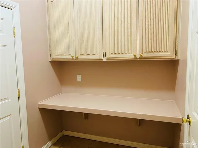 a bathroom with a shower and toilet