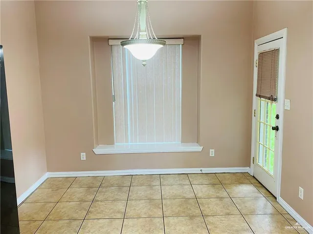 a bathroom with a sink a vanity and a mirror