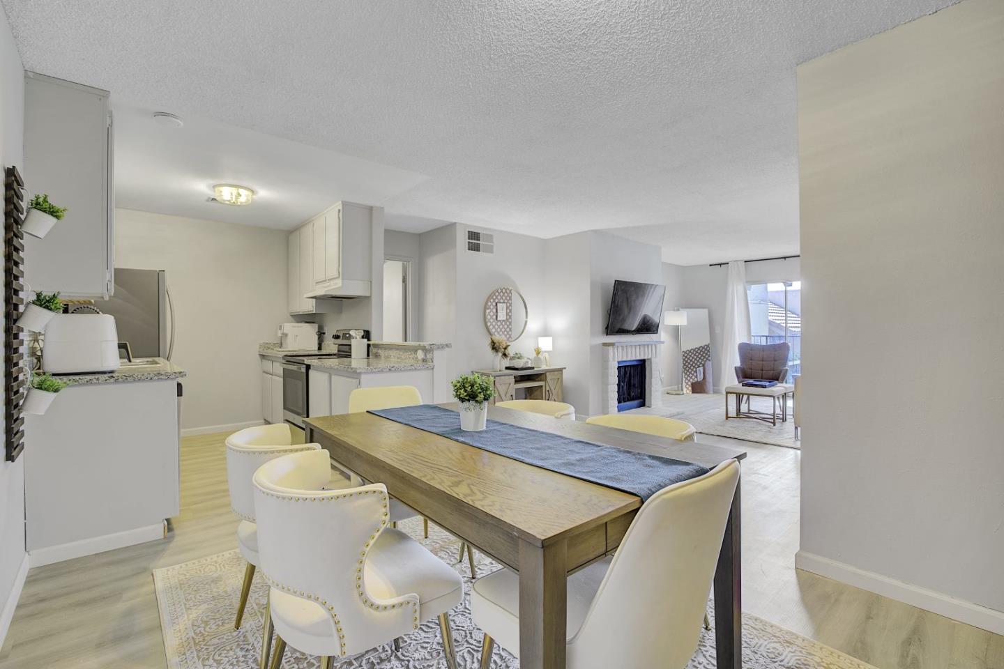 247 North Capitol Avenue, Unit 235 San Jose, CA 95127 - Photo 11 of 30 a dining room with furniture and window