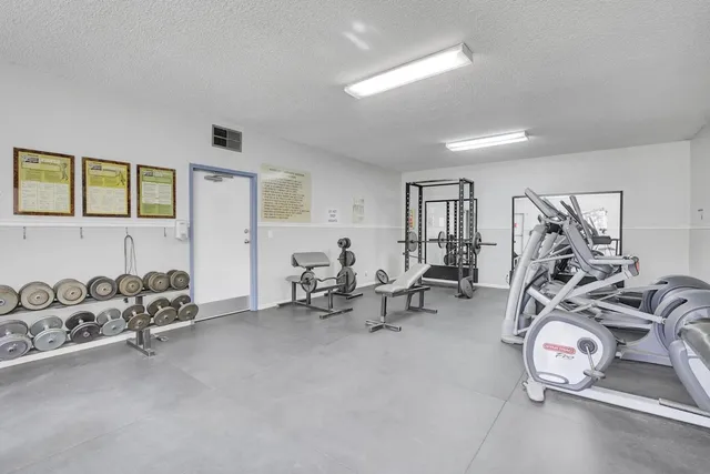 a view of a room with gym equipment