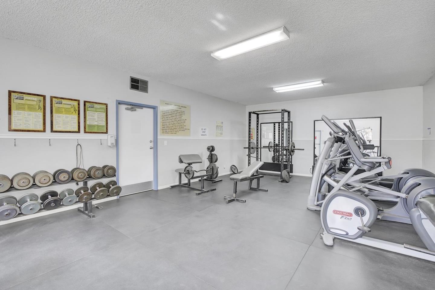 247 North Capitol Avenue, Unit 235 San Jose, CA 95127 - Photo 29 of 30 a view of a room with gym equipment