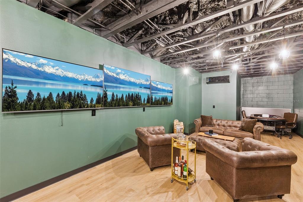 9126 Lake Coventry Court Gotha, FL 34734 - Photo 30 of 75 a patio with lake view and a floor to ceiling window