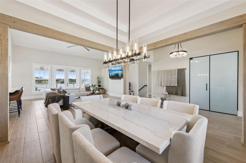 9126 Lake Coventry Court Gotha, FL 34734 - Photo 6 of 75 a view of a dining room with furniture and wooden floor
