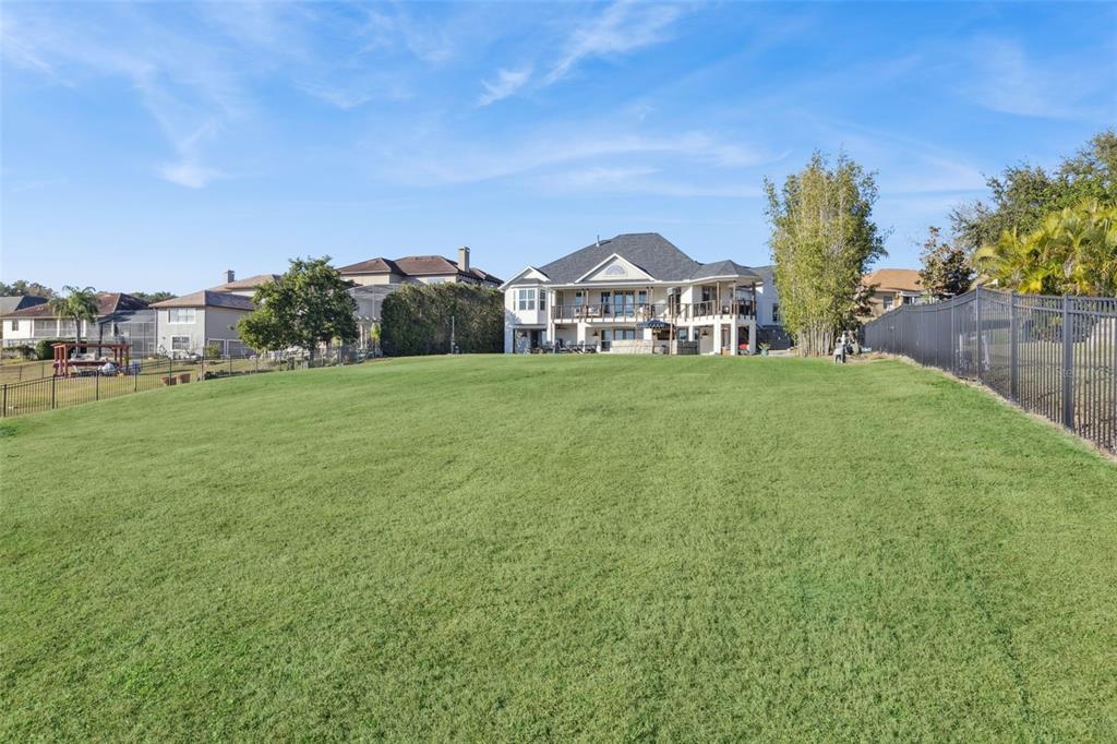 9126 Lake Coventry Court Gotha, FL 34734 - Photo 67 of 75 a front view of a house with a yard