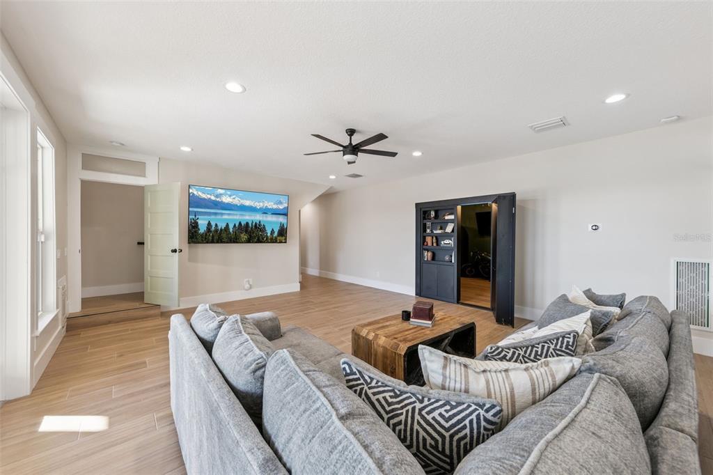 9126 Lake Coventry Court Gotha, FL 34734 - Photo 68 of 99 a living room with furniture and a ceiling fan