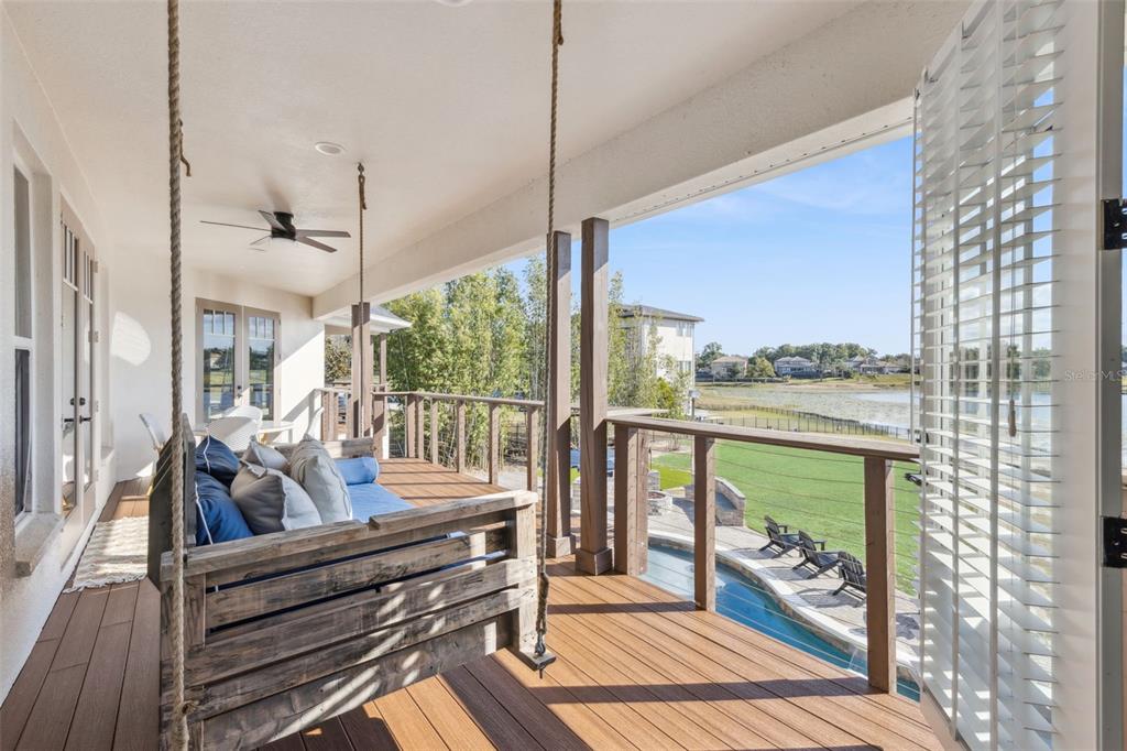 9126 Lake Coventry Court Gotha, FL 34734 - Photo 73 of 75 a living room with large windows