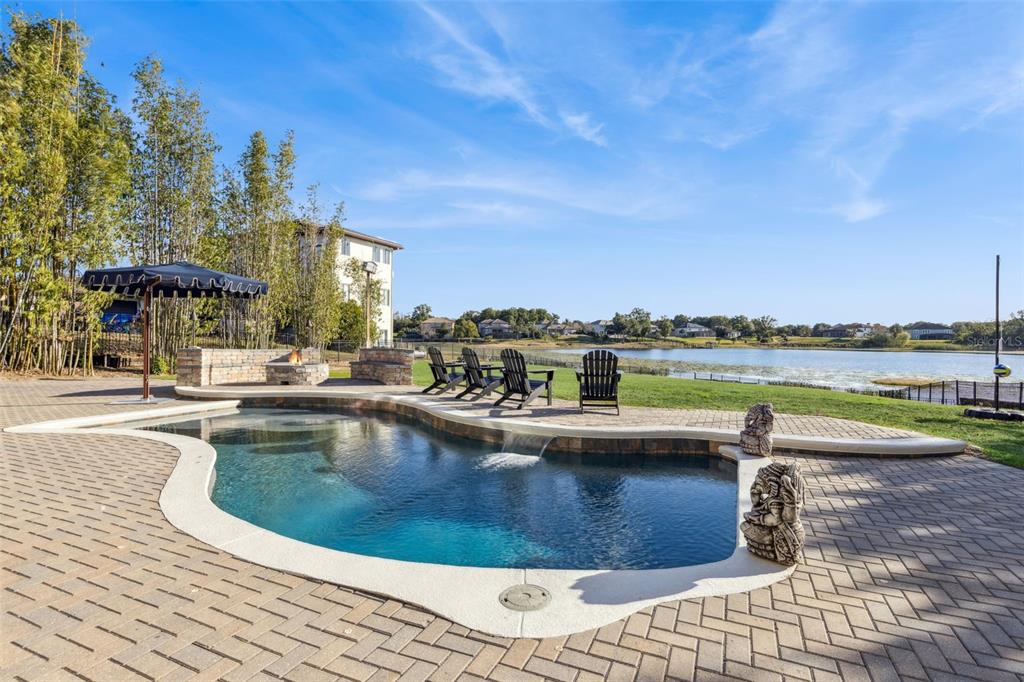 9126 Lake Coventry Court Gotha, FL 34734 - Photo 87 of 99 a view of a swimming pool and an outdoor space