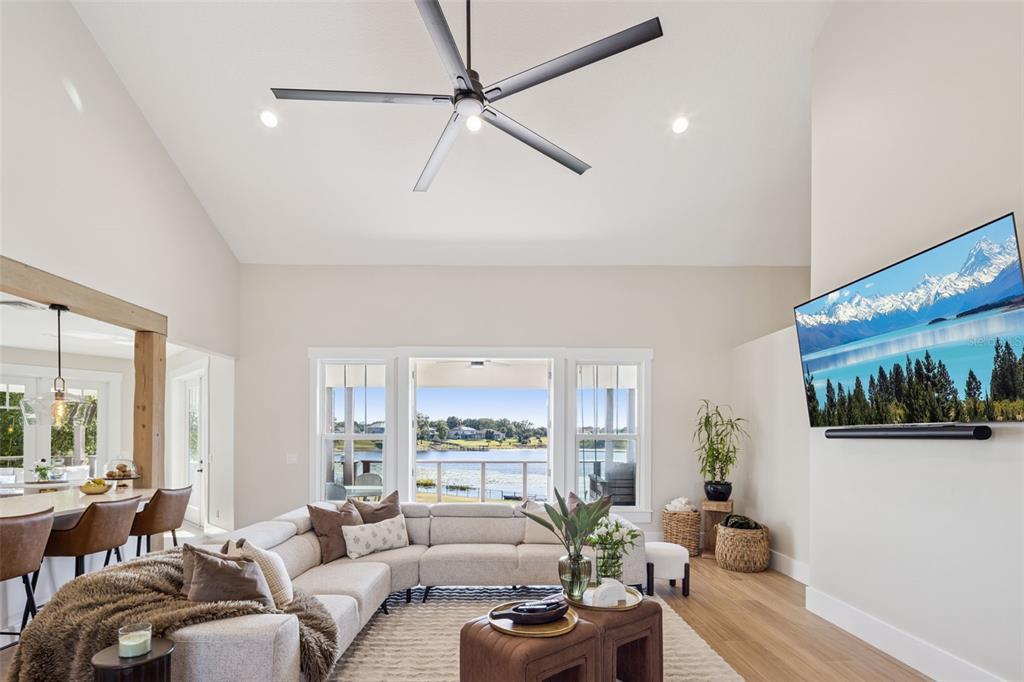 9126 Lake Coventry Court Gotha, FL 34734 - Photo 9 of 75 a living room with furniture and a large window