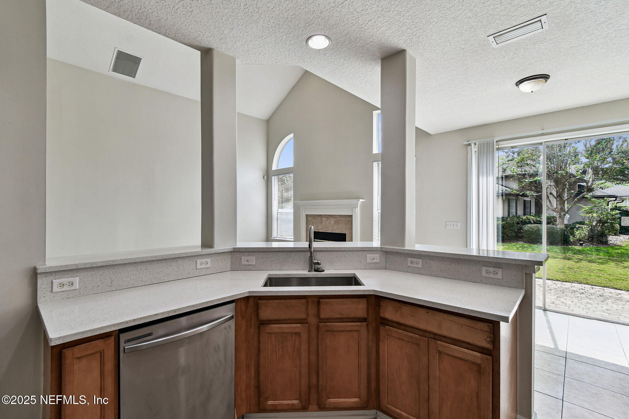 536 Spanish Wells Road Jacksonville, FL 32218 - Photo 13 of 45 a kitchen with a sink and a window
