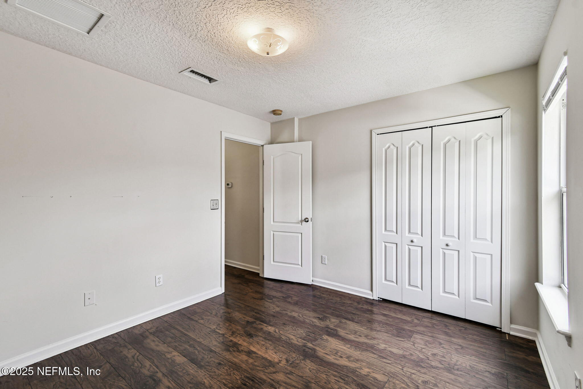 536 Spanish Wells Road Jacksonville, FL 32218 - Photo 24 of 45 a view of a livingroom with wooden floor