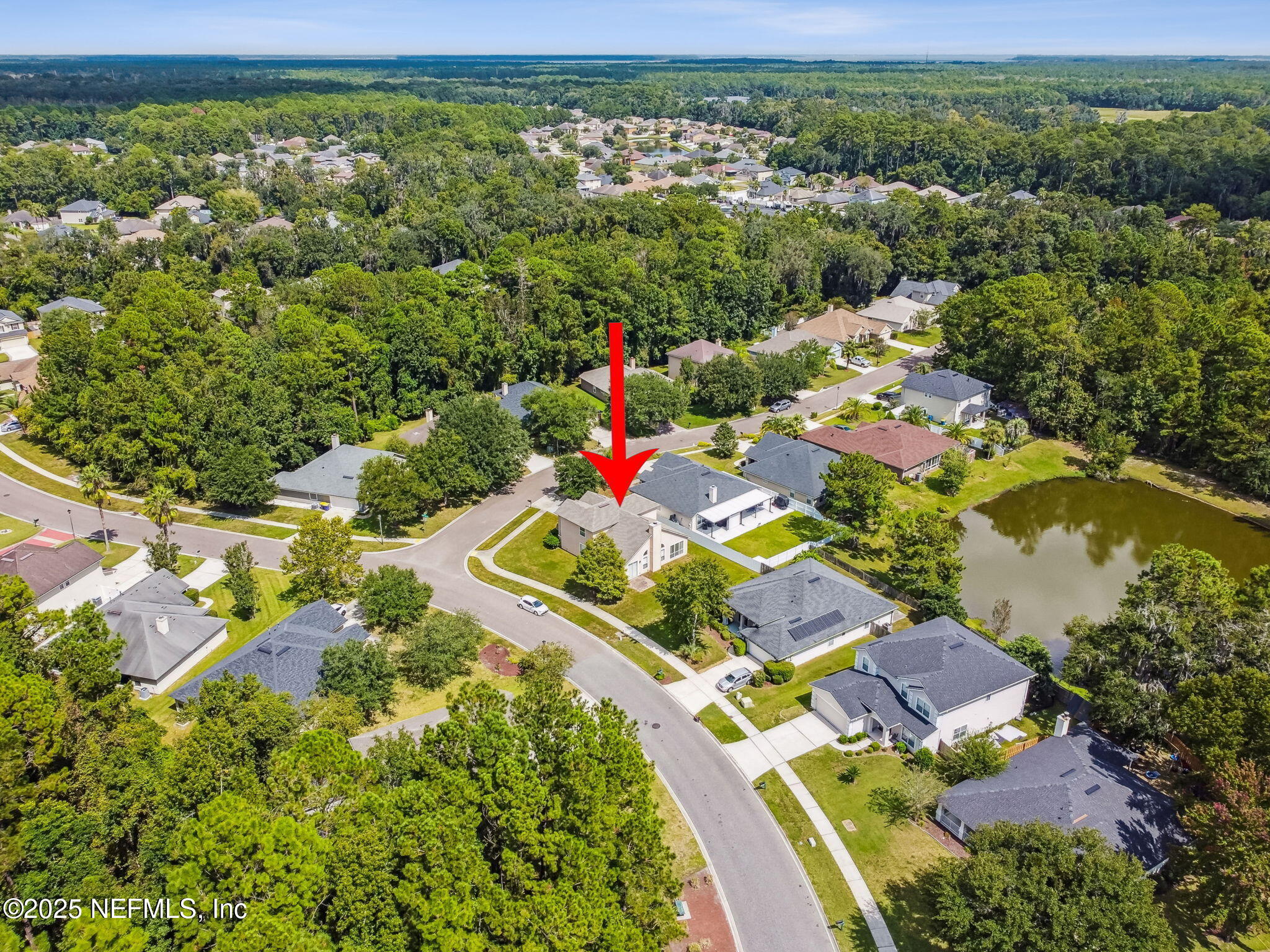 536 Spanish Wells Road Jacksonville, FL 32218 - Photo 36 of 45 an aerial view of residential houses with outdoor space and trees