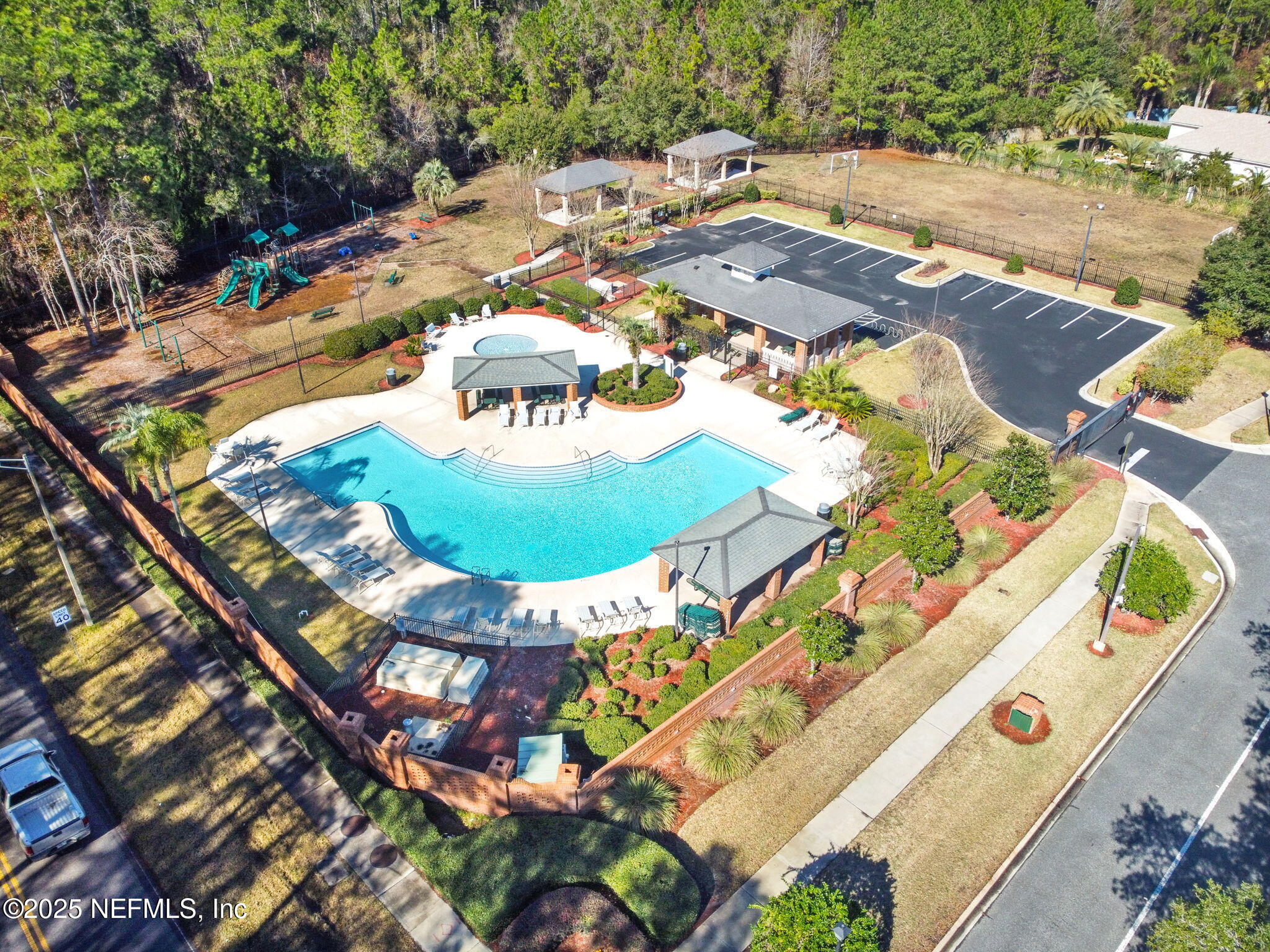 536 Spanish Wells Road Jacksonville, FL 32218 - Photo 38 of 45 a view of a swimming pool in a backyard