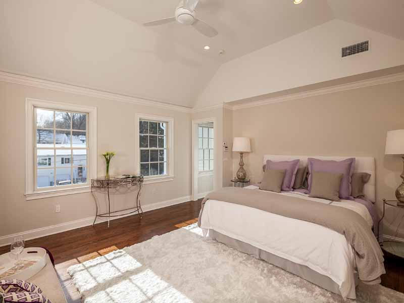1 Laforge Road Darien, CT 06820 - Photo 13 of 24 a spacious bedroom with a large bed and windows