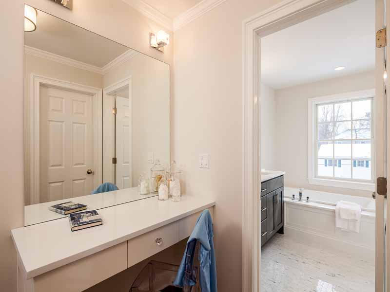 1 Laforge Road Darien, CT 06820 - Photo 14 of 24 a bathroom with a sink double vanity and a bathtub