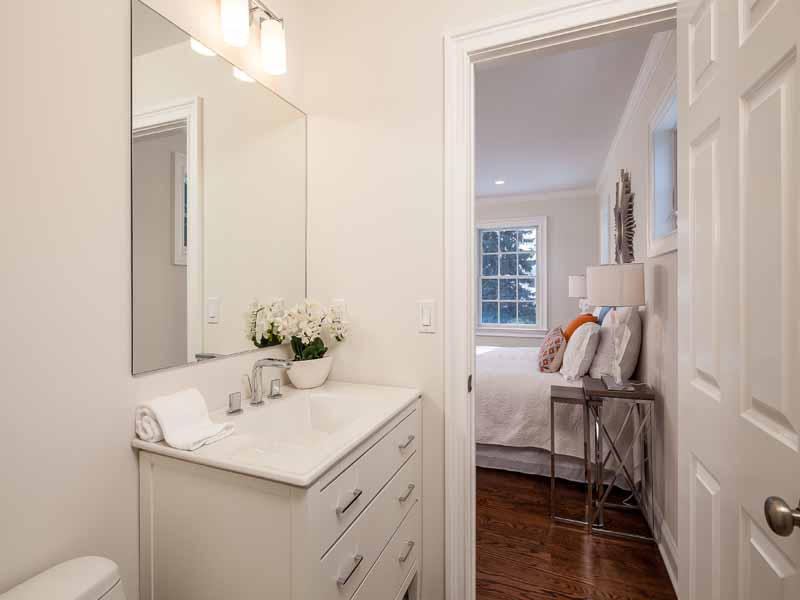 1 Laforge Road Darien, CT 06820 - Photo 21 of 24 a bathroom with a sink and a mirror