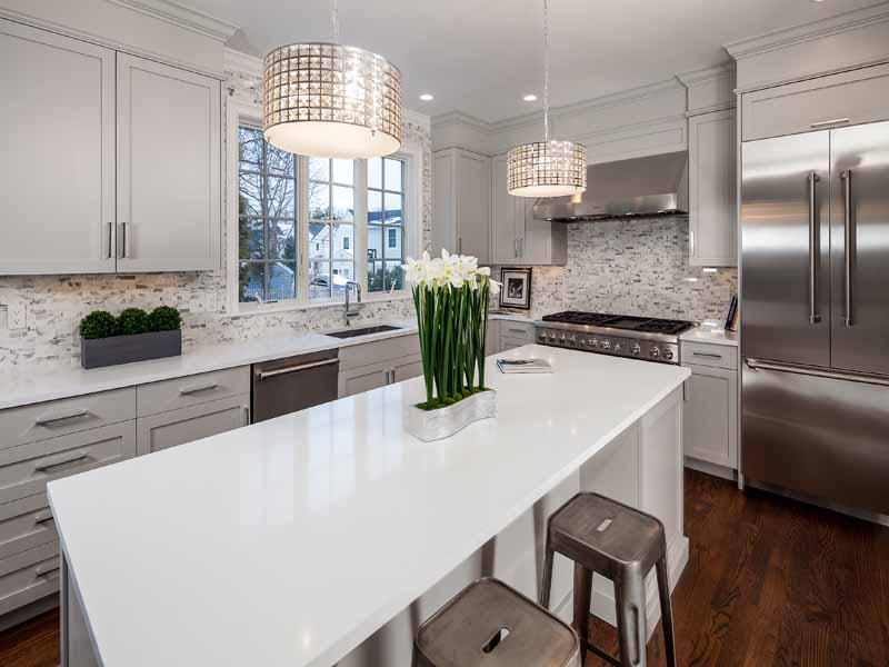 1 Laforge Road Darien, CT 06820 - Photo 8 of 24 a kitchen with stainless steel appliances a dining table chairs and granite counter tops