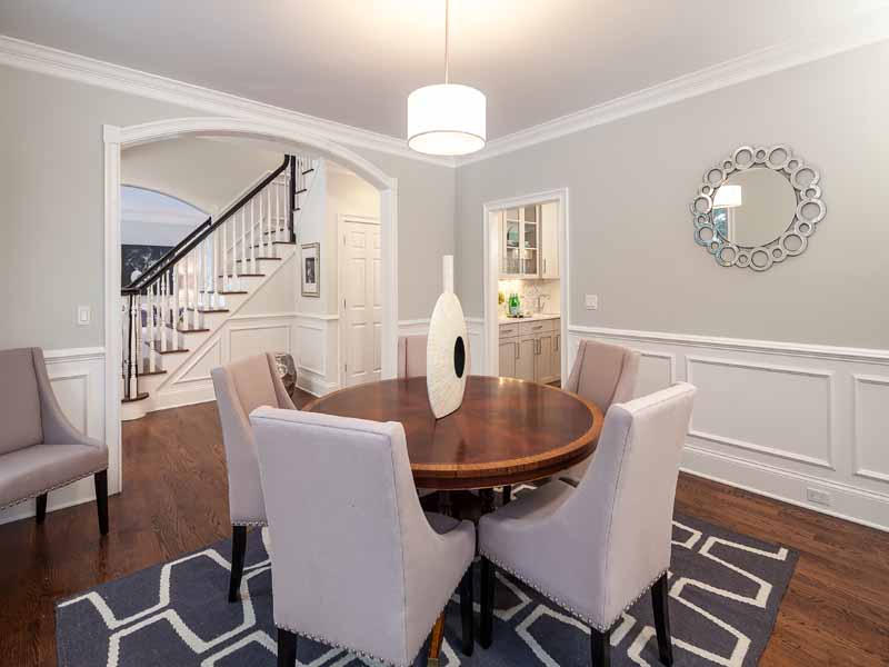 1 Laforge Road Darien, CT 06820 - Photo 10 of 24 a dining room with furniture a chandelier and wooden floor