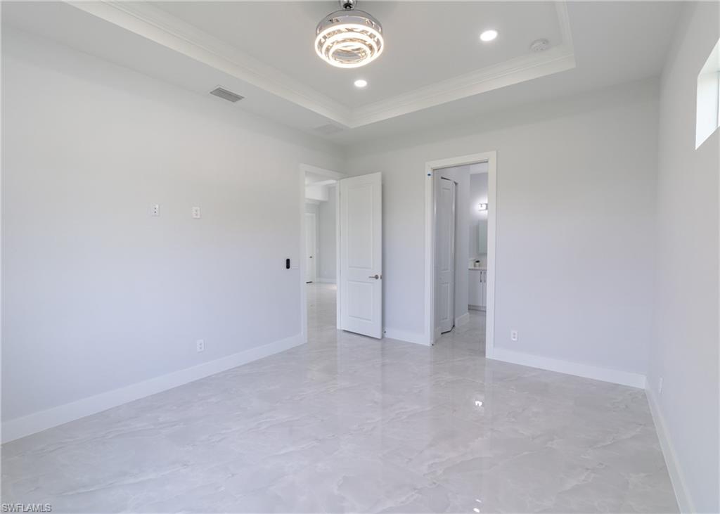 3408 12th Street Southwest Lehigh Acres, FL 33976 - Photo 14 of 47 a view of an empty room