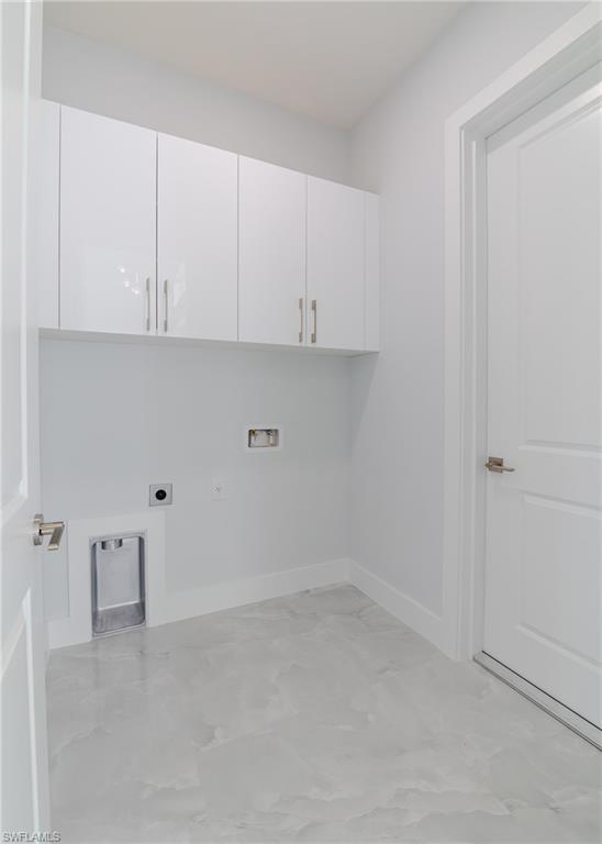 3408 12th Street Southwest Lehigh Acres, FL 33976 - Photo 26 of 47 a view of an empty kitchen