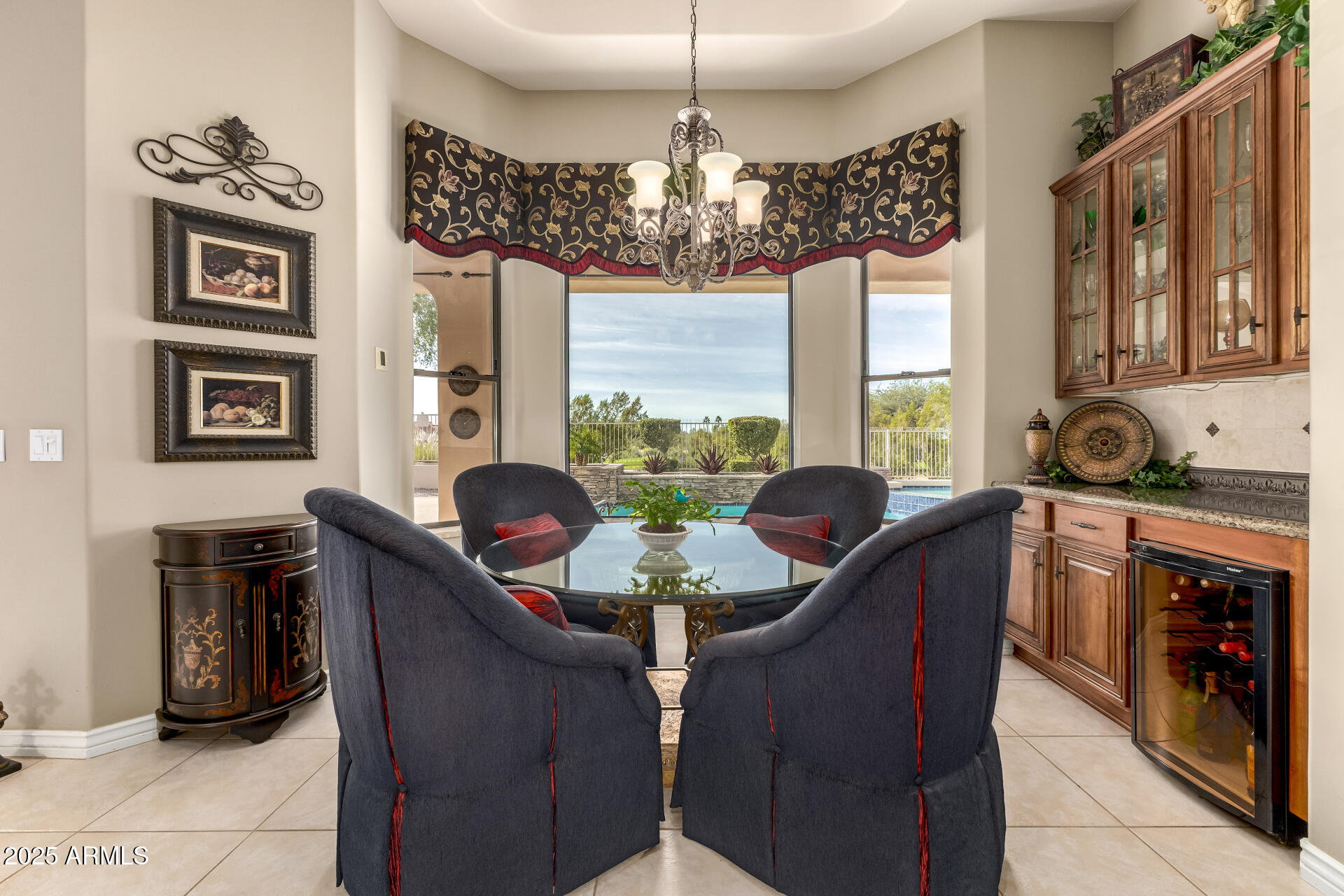 4055 North Recker Road Mesa, AZ 85215 - Photo 11 of 70 a dining room with furniture and window