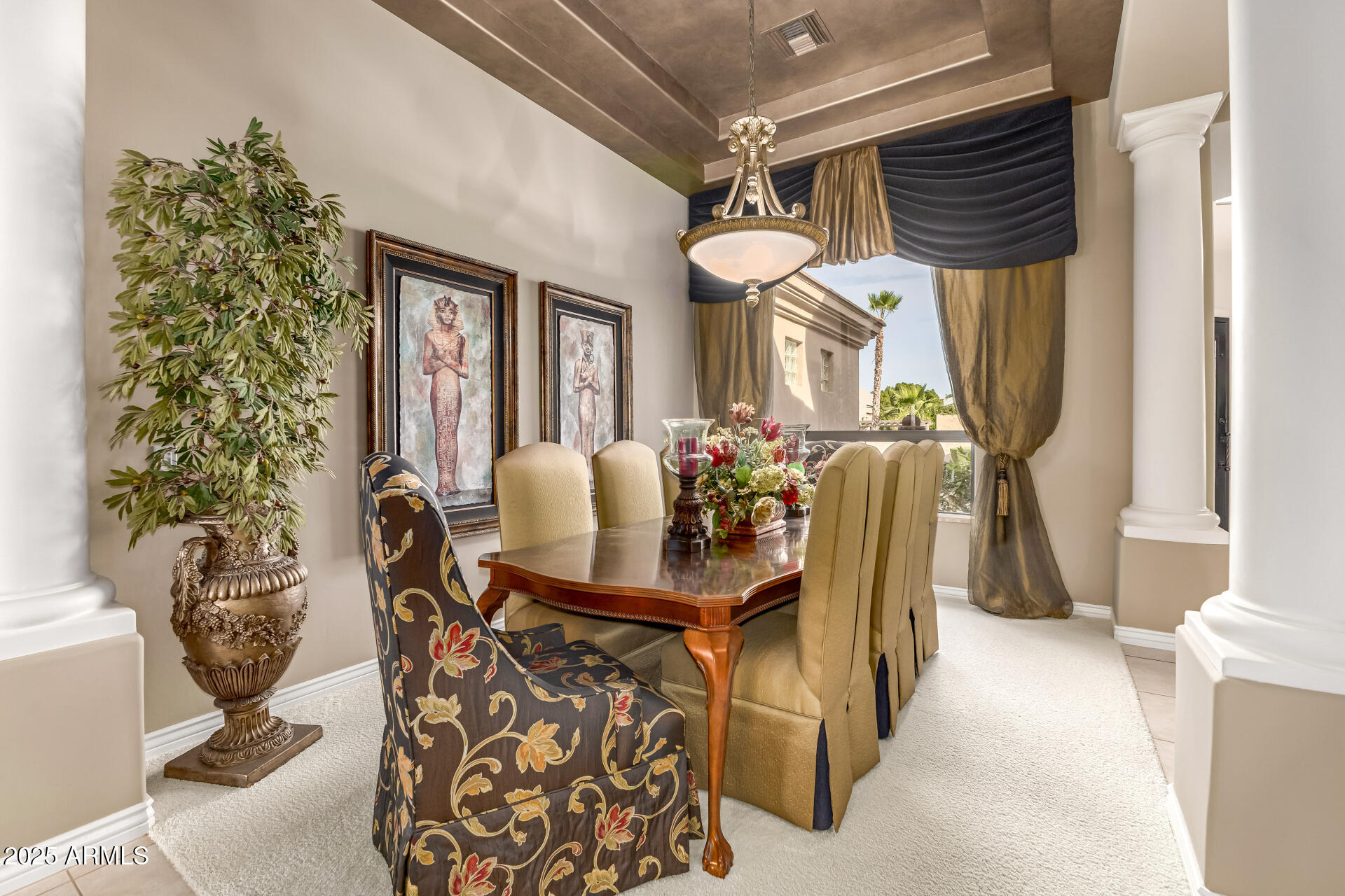 4055 North Recker Road Mesa, AZ 85215 - Photo 15 of 70 a view of a dining room with furniture and a window