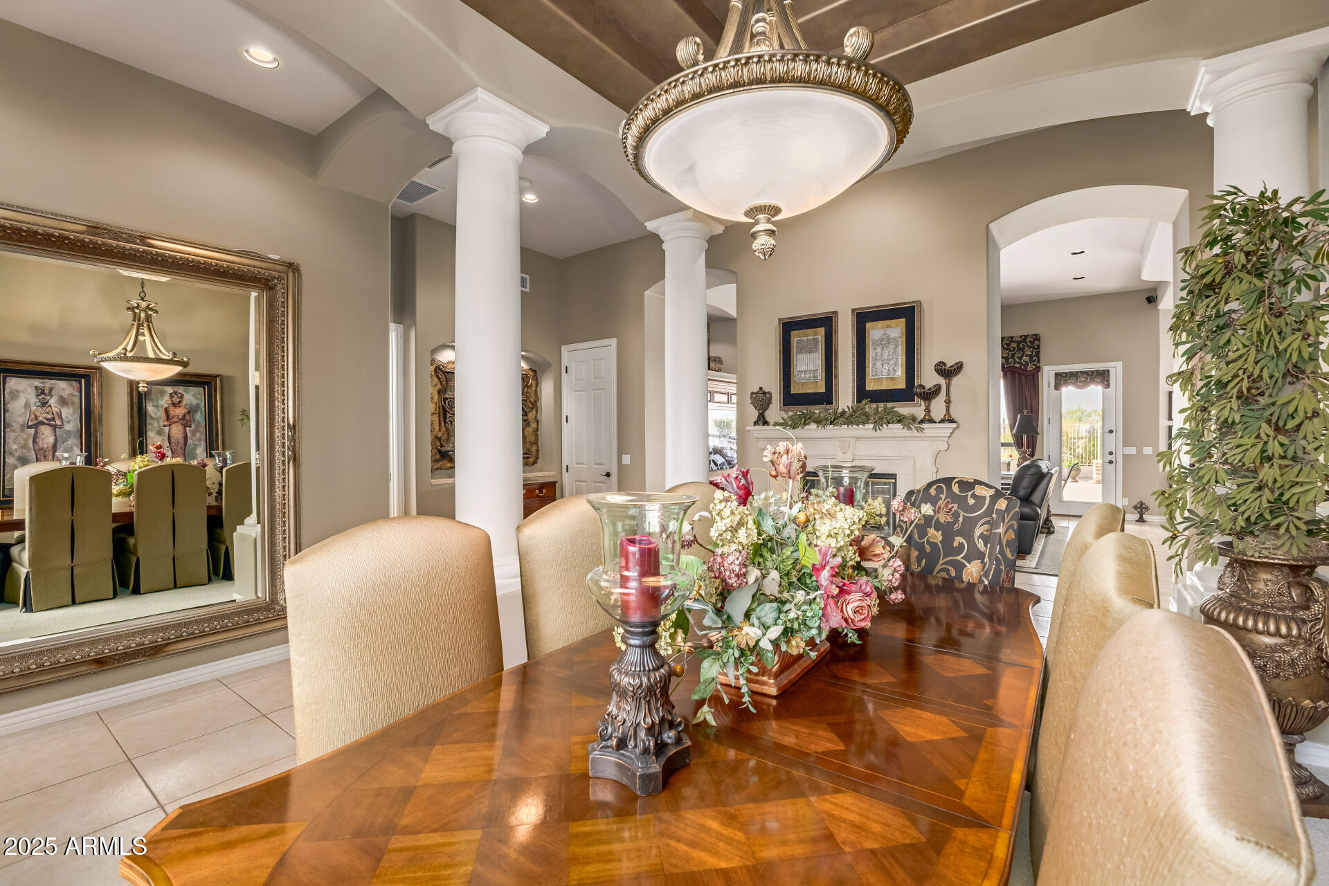 4055 North Recker Road Mesa, AZ 85215 - Photo 16 of 70 a view of a livingroom with furniture and a chandelier