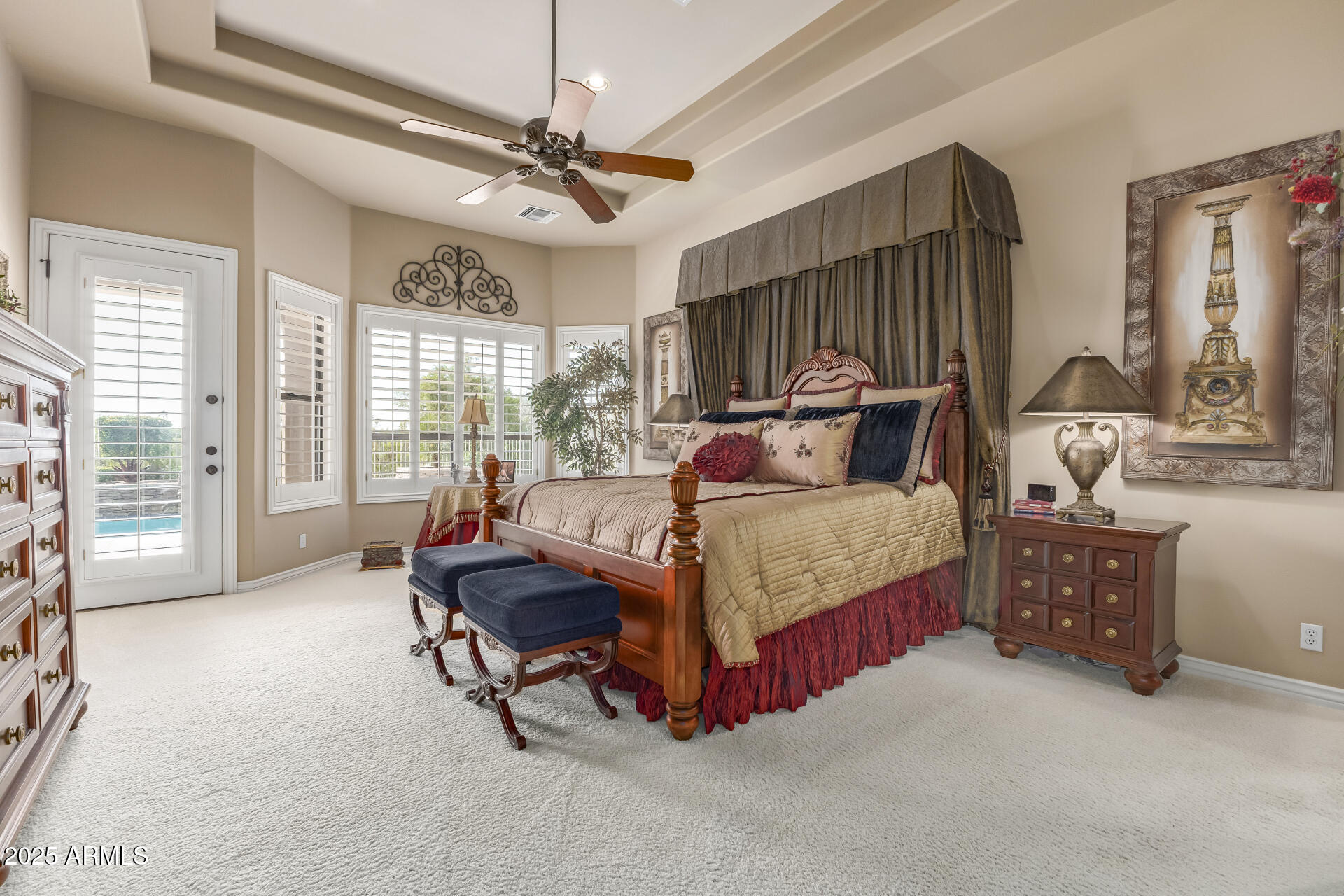 4055 North Recker Road Mesa, AZ 85215 - Photo 18 of 70 a bedroom with a bed furniture and a large window