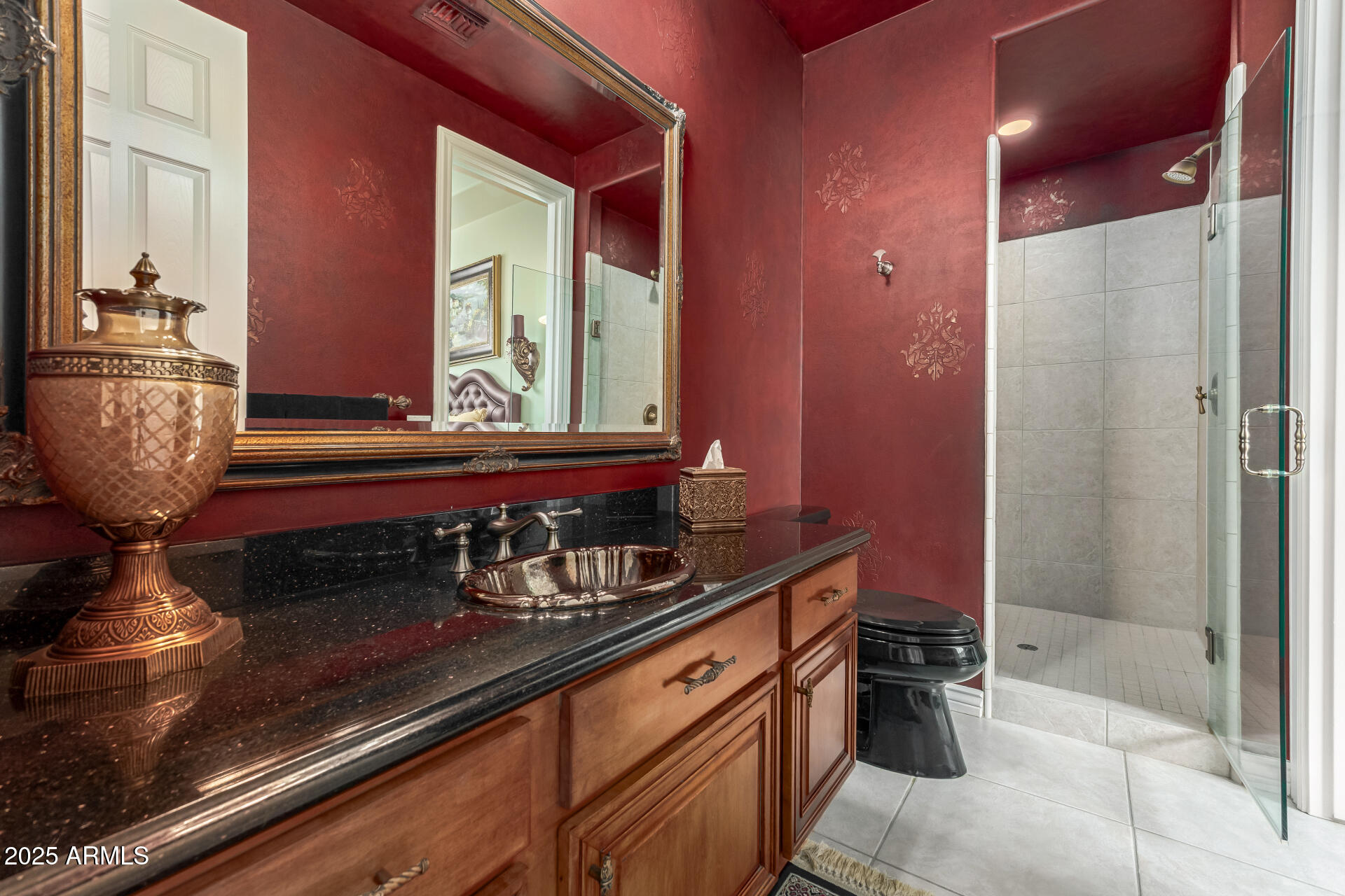 4055 North Recker Road Mesa, AZ 85215 - Photo 28 of 70 a bathroom with a sink and a mirror