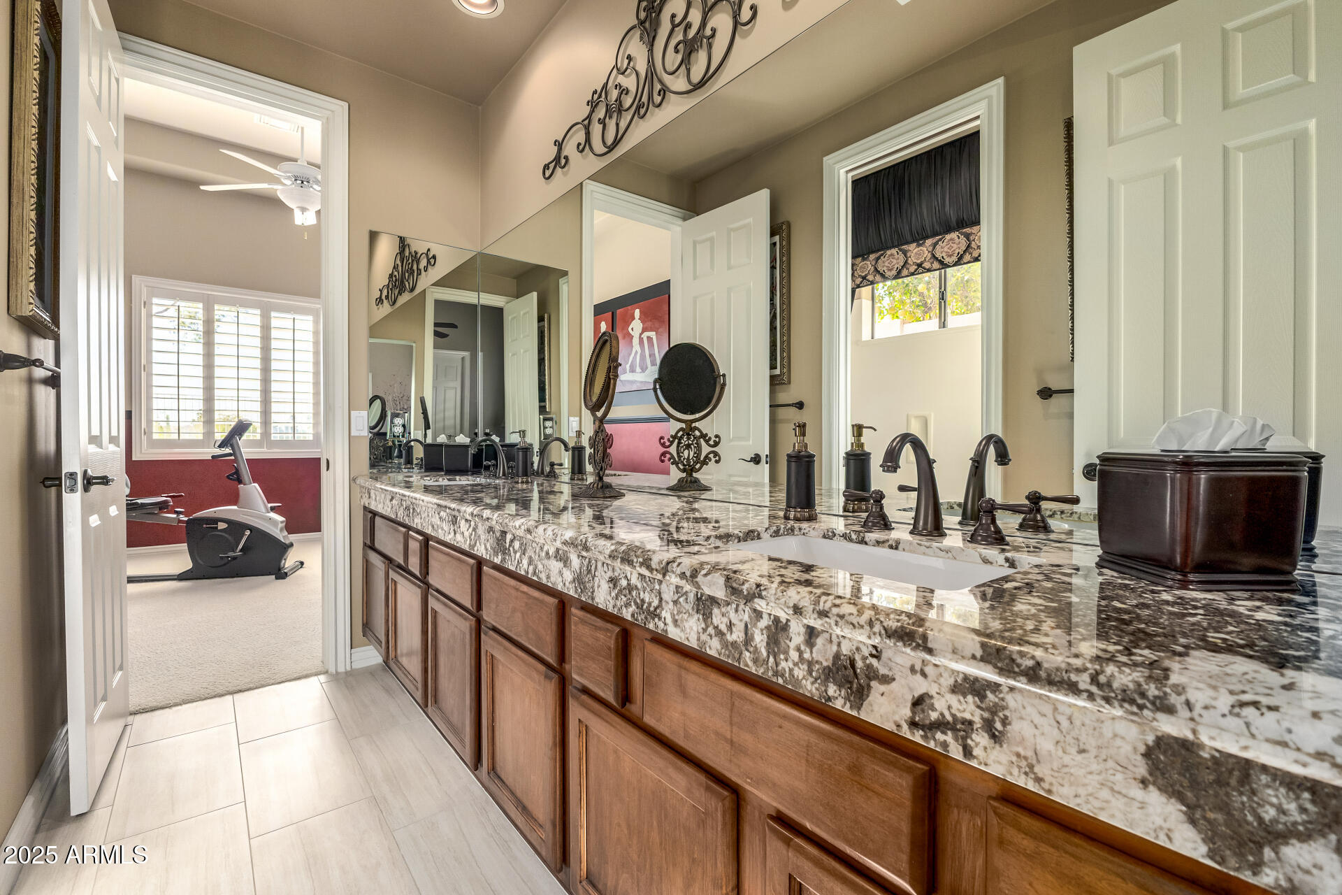 4055 North Recker Road Mesa, AZ 85215 - Photo 31 of 70 a kitchen with sink and mirror