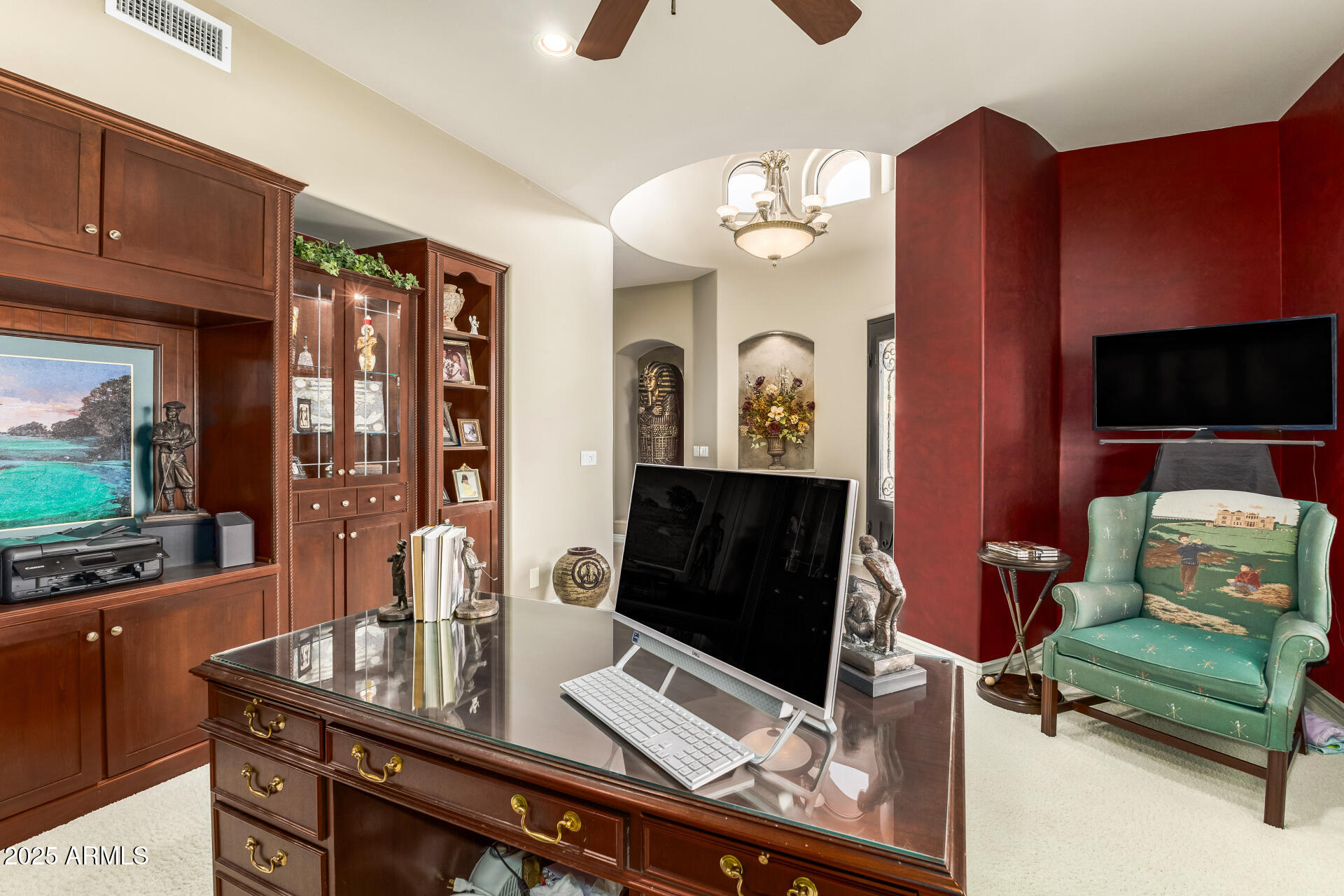 4055 North Recker Road Mesa, AZ 85215 - Photo 37 of 70 a living room with furniture and a flat screen tv