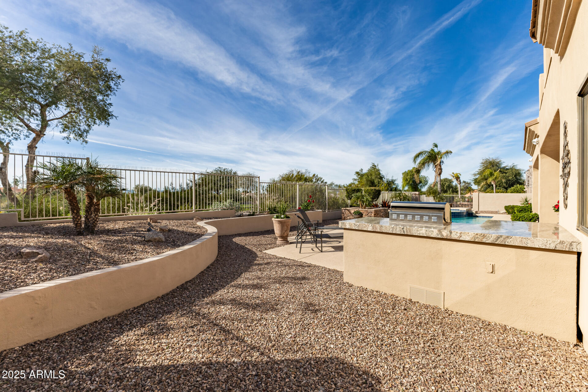 4055 North Recker Road Mesa, AZ 85215 - Photo 40 of 70 a view of a swimming pool with a patio