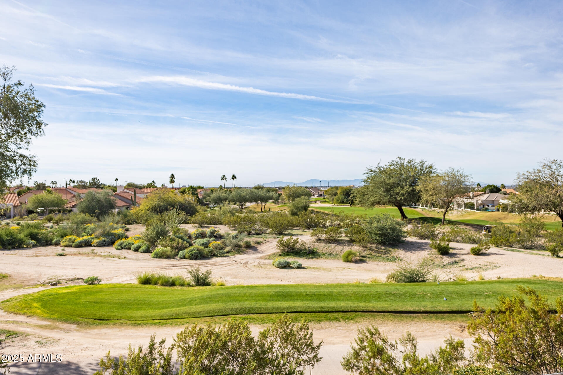 4055 North Recker Road Mesa, AZ 85215 - Photo 46 of 70 a view of a lake with houses in the back