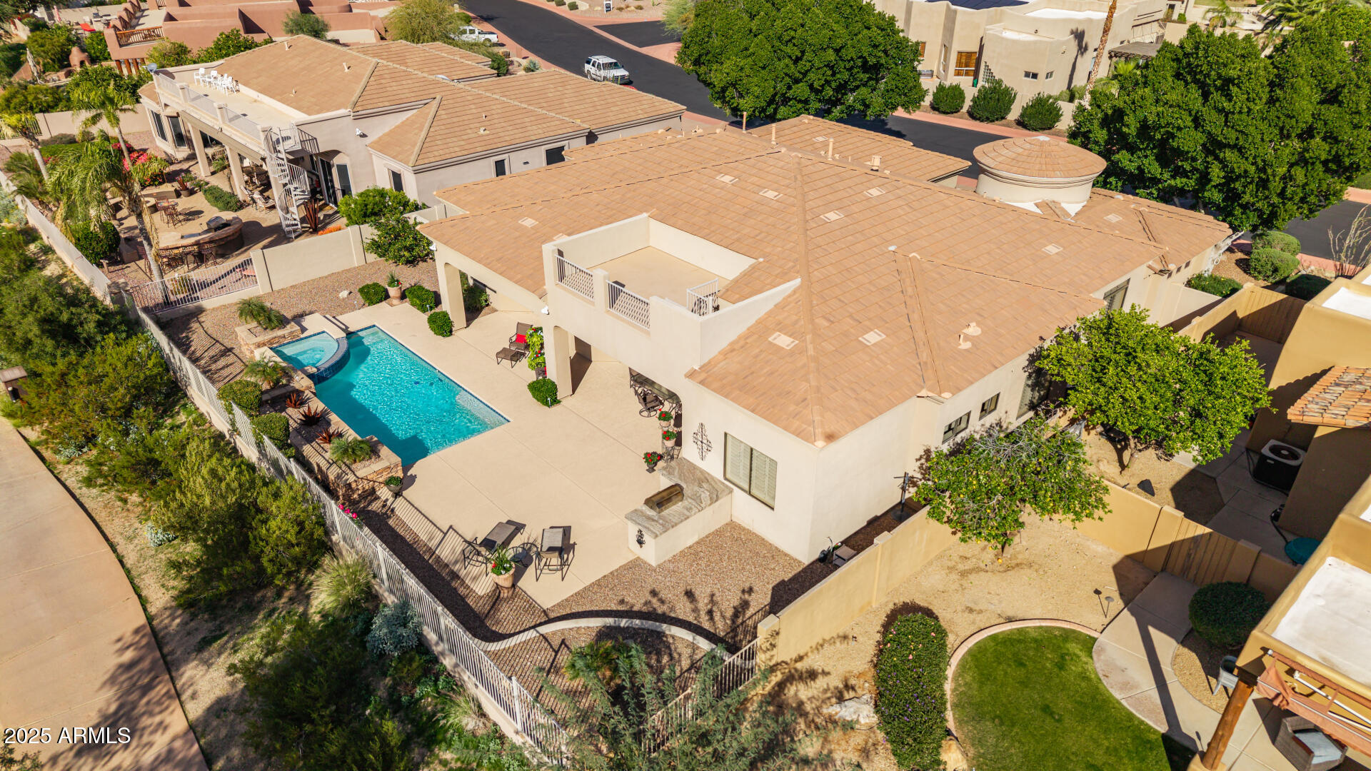 4055 North Recker Road Mesa, AZ 85215 - Photo 52 of 70 an aerial view of a house with a swimming pool and outdoor seating