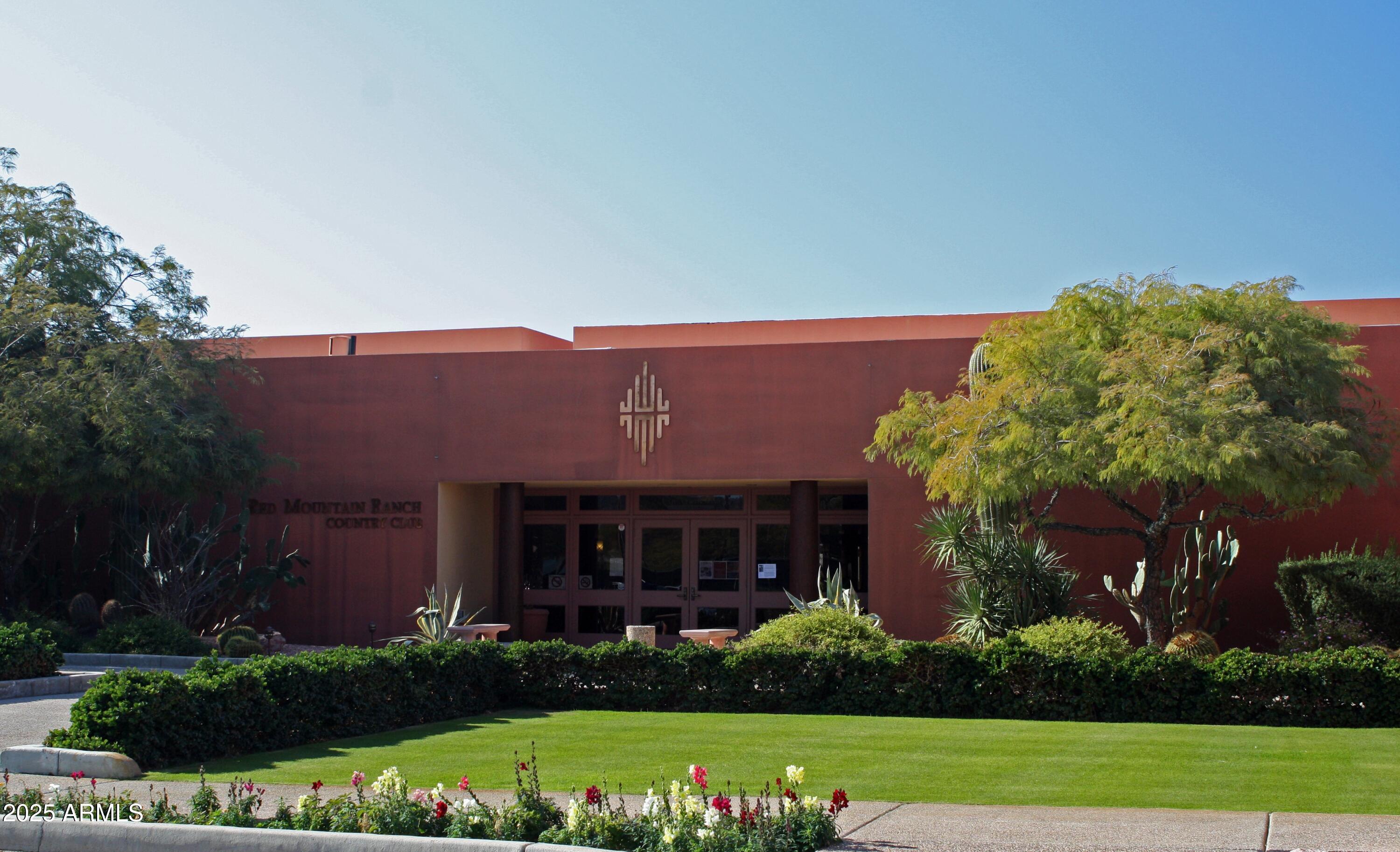 4055 North Recker Road Mesa, AZ 85215 - Photo 60 of 70 a front view of a house with a yard