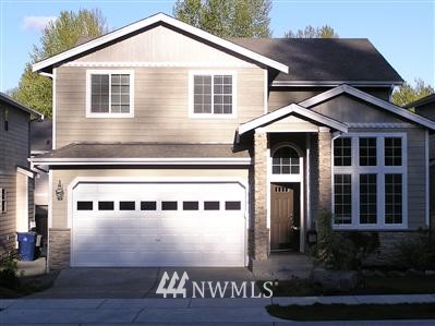 23811 17th Place West Bothell, WA 98021 - Photo 1 of 1 a front view of a house with plants