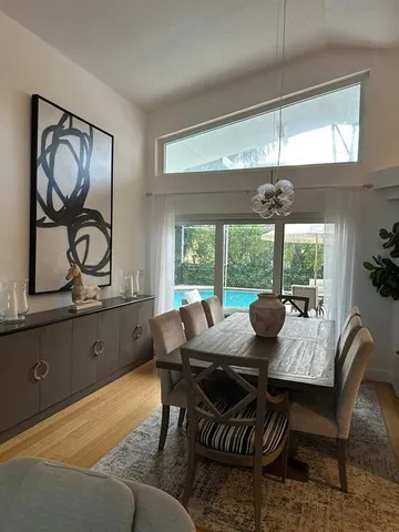 a view of a dining room with furniture window and outside view