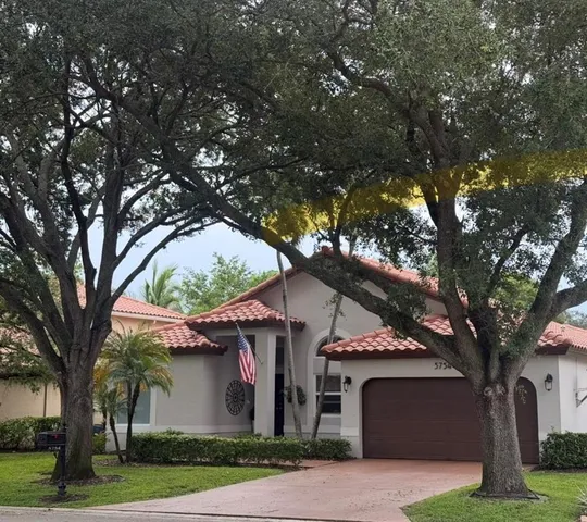 a front view of house with yard